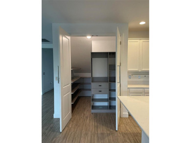 Discover this exceptional residence in the exclusive, Private on Deer Island Country Club in Florida - for sale on GolfHomes.com, golf home, golf lot