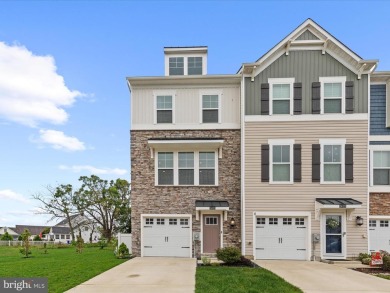 Welcome to 24325 Cassville Lane, a beautiful 3-story End Unit on Plantation Lakes Golf and Country Club in Delaware - for sale on GolfHomes.com, golf home, golf lot