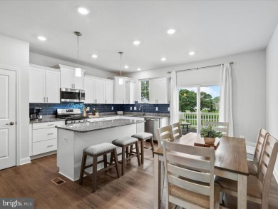 Welcome to 24325 Cassville Lane, a beautiful 3-story End Unit on Plantation Lakes Golf and Country Club in Delaware - for sale on GolfHomes.com, golf home, golf lot