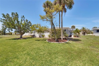 Welcome to Florida Living at Its Finest in Sandal Haven Estates on Lemon Bay Golf Club in Florida - for sale on GolfHomes.com, golf home, golf lot