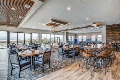 Welcome to this luxury townhouse, where craftsmanship seamlessly on Heath Golf and Yacht Club in Texas - for sale on GolfHomes.com, golf home, golf lot