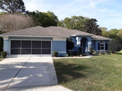 Beautifully updated home on an quiet street with a very private on Royal Oaks Golf Club in Florida - for sale on GolfHomes.com, golf home, golf lot