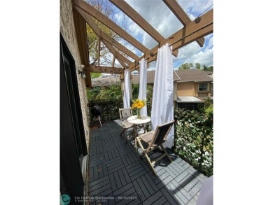 Experience breathtaking views from this spacious corner unit at on Jacaranda Golf Club in Florida - for sale on GolfHomes.com, golf home, golf lot