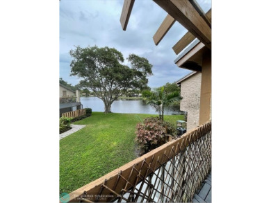 Experience breathtaking views from this spacious corner unit at on Jacaranda Golf Club in Florida - for sale on GolfHomes.com, golf home, golf lot