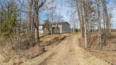 Turn the key and start enjoying lake life from this fully on Hardwoods Golf Club At Mille Lacs in Minnesota - for sale on GolfHomes.com, golf home, golf lot