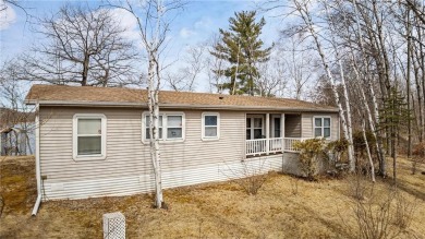 Turn the key and start enjoying lake life from this fully on Hardwoods Golf Club At Mille Lacs in Minnesota - for sale on GolfHomes.com, golf home, golf lot