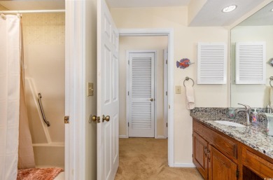 This furnished 2-bedroom condo is in the perfect location for on Surf Golf and Beach Club in South Carolina - for sale on GolfHomes.com, golf home, golf lot