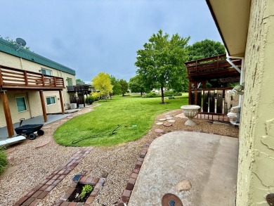 Enjoy beautiful, low-maintenance living in this updated 914 sq on Smoky Hill Country Club in Kansas - for sale on GolfHomes.com, golf home, golf lot