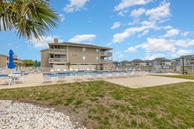 This furnished 2-bedroom condo is in the perfect location for on Surf Golf and Beach Club in South Carolina - for sale on GolfHomes.com, golf home, golf lot