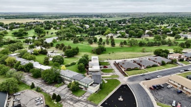 Enjoy beautiful, low-maintenance living in this updated 914 sq on Smoky Hill Country Club in Kansas - for sale on GolfHomes.com, golf home, golf lot
