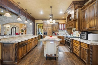 This is an absolutely stunning Tuscan inspired corner lot home on Pinnacle Golf and Boat Club in Texas - for sale on GolfHomes.com, golf home, golf lot