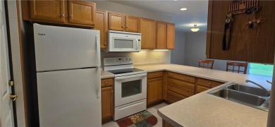 Affordable and Efficient this Two-bedroom town home offers main on Preston Golf and Country Club in Minnesota - for sale on GolfHomes.com, golf home, golf lot