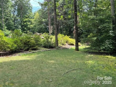 Experience relaxed luxury living in Flat Rock's premier on Kenmure Country Club in North Carolina - for sale on GolfHomes.com, golf home, golf lot