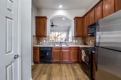 Beautifully maintained and updated one story townhome backing to on Ridgeview Ranch Golf Club in Texas - for sale on GolfHomes.com, golf home, golf lot