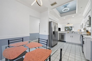 REMODELED, contemporary GROUND FLOOR condominium located on on Stoneybrook Golf and Country Club of Sarasota in Florida - for sale on GolfHomes.com, golf home, golf lot