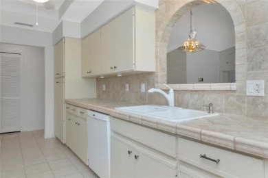 Move-in ready pool home in Peridia Golf & Country Club! This on Peridia Golf and Country Club in Florida - for sale on GolfHomes.com, golf home, golf lot