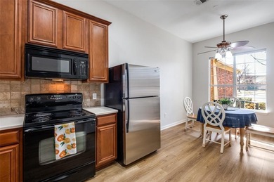 Beautifully maintained and updated one story townhome backing to on Ridgeview Ranch Golf Club in Texas - for sale on GolfHomes.com, golf home, golf lot