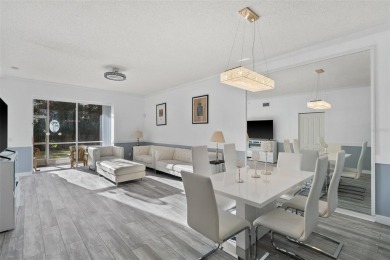 REMODELED, contemporary GROUND FLOOR condominium located on on Stoneybrook Golf and Country Club of Sarasota in Florida - for sale on GolfHomes.com, golf home, golf lot