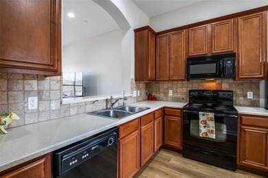 Beautifully maintained and updated one story townhome backing to on Ridgeview Ranch Golf Club in Texas - for sale on GolfHomes.com, golf home, golf lot