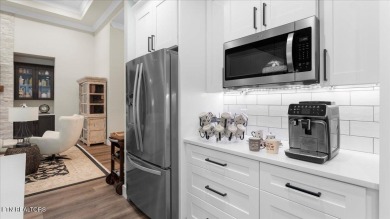 Welcome to 140 Utsesti Way! Discover contemporary elegance and on Toqua Golf Course - Loudon County in Tennessee - for sale on GolfHomes.com, golf home, golf lot