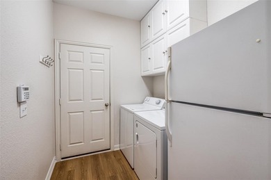 Beautifully maintained and updated one story townhome backing to on Ridgeview Ranch Golf Club in Texas - for sale on GolfHomes.com, golf home, golf lot