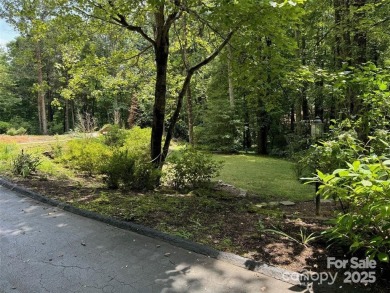 Experience relaxed luxury living in Flat Rock's premier on Kenmure Country Club in North Carolina - for sale on GolfHomes.com, golf home, golf lot