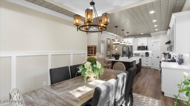 Welcome to 140 Utsesti Way! Discover contemporary elegance and on Toqua Golf Course - Loudon County in Tennessee - for sale on GolfHomes.com, golf home, golf lot