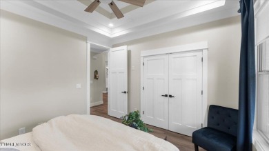 Welcome to 140 Utsesti Way! Discover contemporary elegance and on Toqua Golf Course - Loudon County in Tennessee - for sale on GolfHomes.com, golf home, golf lot