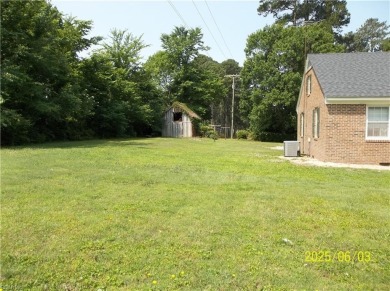Well maintained brick ranch with a short walk between the hedges on Cypress Cove Country Club in Virginia - for sale on GolfHomes.com, golf home, golf lot