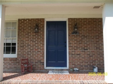 Well maintained brick ranch with a short walk between the hedges on Cypress Cove Country Club in Virginia - for sale on GolfHomes.com, golf home, golf lot