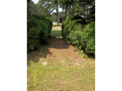 Well maintained brick ranch with a short walk between the hedges on Cypress Cove Country Club in Virginia - for sale on GolfHomes.com, golf home, golf lot