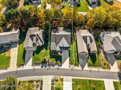 Welcome to 140 Utsesti Way! Discover contemporary elegance and on Toqua Golf Course - Loudon County in Tennessee - for sale on GolfHomes.com, golf home, golf lot