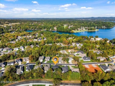 Welcome to 140 Utsesti Way! Discover contemporary elegance and on Toqua Golf Course - Loudon County in Tennessee - for sale on GolfHomes.com, golf home, golf lot