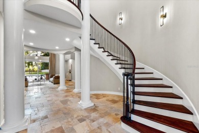 Behind the private gates of this distinguished Belleair estate on Belleview Biltmore Golf Club in Florida - for sale on GolfHomes.com, golf home, golf lot
