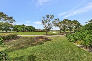 ***PRIMARY BEDROOM IS UPSTAIRS***Welcome to the epitome of on Broken Sound Golf and Club  in Florida - for sale on GolfHomes.com, golf home, golf lot