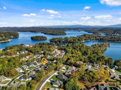 Welcome to 140 Utsesti Way! Discover contemporary elegance and on Toqua Golf Course - Loudon County in Tennessee - for sale on GolfHomes.com, golf home, golf lot