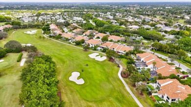 ***PRIMARY BEDROOM IS UPSTAIRS***Welcome to the epitome of on Broken Sound Golf and Club  in Florida - for sale on GolfHomes.com, golf home, golf lot