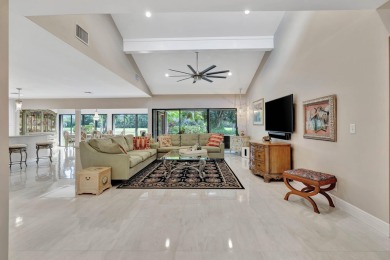 This stunning home boasts a bright and expansive great room with on Eastpointe Country Club in Florida - for sale on GolfHomes.com, golf home, golf lot