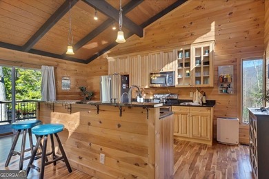 Welcome to 455 Tamarack Drive, a light-filled mountain retreat on Bent Tree Golf Course in Georgia - for sale on GolfHomes.com, golf home, golf lot