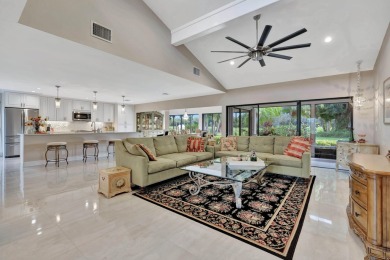 This stunning home boasts a bright and expansive great room with on Eastpointe Country Club in Florida - for sale on GolfHomes.com, golf home, golf lot