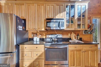 Welcome to 455 Tamarack Drive, a light-filled mountain retreat on Bent Tree Golf Course in Georgia - for sale on GolfHomes.com, golf home, golf lot