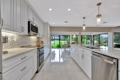 This stunning home boasts a bright and expansive great room with on Eastpointe Country Club in Florida - for sale on GolfHomes.com, golf home, golf lot