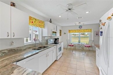 As you enter the enclosed entryway and step into the foyer the on Scepter Golf Club in Florida - for sale on GolfHomes.com, golf home, golf lot