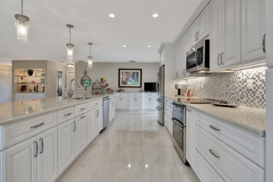 This stunning home boasts a bright and expansive great room with on Eastpointe Country Club in Florida - for sale on GolfHomes.com, golf home, golf lot