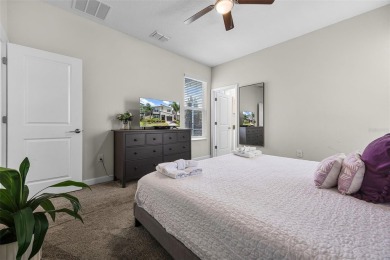 Step into resort-style living at 661 Drop Shot Drive, a on The Oasis Club at Champions Gate in Florida - for sale on GolfHomes.com, golf home, golf lot