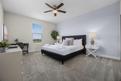 Step into resort-style living at 661 Drop Shot Drive, a on The Oasis Club at Champions Gate in Florida - for sale on GolfHomes.com, golf home, golf lot