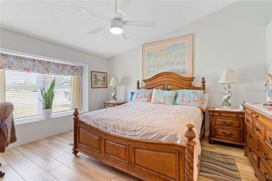 As you enter the enclosed entryway and step into the foyer the on Scepter Golf Club in Florida - for sale on GolfHomes.com, golf home, golf lot