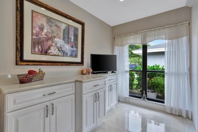 This stunning home boasts a bright and expansive great room with on Eastpointe Country Club in Florida - for sale on GolfHomes.com, golf home, golf lot