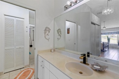 As you enter the enclosed entryway and step into the foyer the on Scepter Golf Club in Florida - for sale on GolfHomes.com, golf home, golf lot