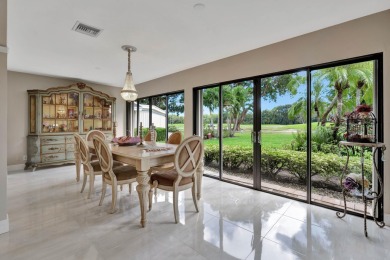 This stunning home boasts a bright and expansive great room with on Eastpointe Country Club in Florida - for sale on GolfHomes.com, golf home, golf lot